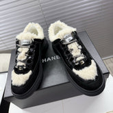 CHANEL 25S SNEAKERS WITH FUR ACCENTS 35MM IN BLACK CALFSKIN