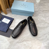 PRADA 25S LOAFERS IN BLACK CALFSKIN
