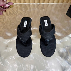 ALAIA PLATFORM THONG SANDALS 25S IN BLACK RAFFIA AND CALFSKIN