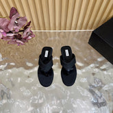 ALAIA PLATFORM THONG SANDALS 25S IN BLACK RAFFIA AND CALFSKIN