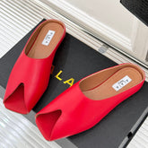 ALAIA FLAT MULE IN CRIMSON RED LAMBSKIN