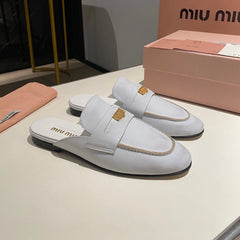 MULES SLIPPERS WHITE COWHIDE WITH GOLD COIN