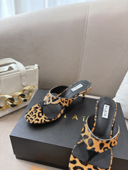 ALAIA HEELED THONG 25S 55 MM IN LEOPARD PONY HAIR LEATHER