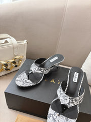 ALAIA HEELED THONG SANDALS 25S 55MM IN WHITE AND BLACK LAMBSKIN SNAKE-EMBOSSED