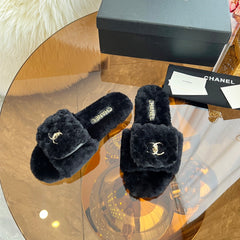 CHANEL 25S FUR SLIPPERS IN BLACK LOGO GOLD HARDWRE