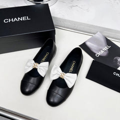 CHANEL 25S MARY JANES IN BLACK CALFSKIN WITH WHITE BOW GOLD HARDWRE
