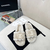 CHANEL 25S FUR SLIPPERS WITH EXPOSED-STITCH STRAPS IN LIGHT GRAY