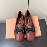 LOAFERS WITH BOW IN RED BROWN SHEEPSKIN
