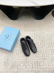 TASSEL LOAFERS IN BLACK LAMBSKIN