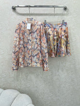 ZIMMER STAND-COLLAR PRINTED STUDDED TOP AND HIGH-WAIST FLARED SKIRT SET