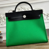 ZIP CABINE 31 BAG IN EMERALD GREEN CANVAS AND BLACK CALFSKIN