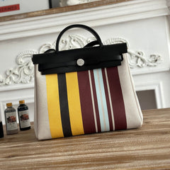 HERBAG ZIP 31 LAQUERED BAG IN BROWN MIX YELLOW H PLUME CANVAS