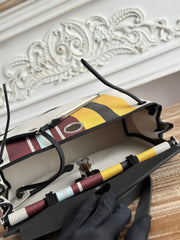 HERBAG ZIP 31 LAQUERED BAG IN BROWN MIX YELLOW H PLUME CANVAS