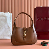 JACKIE SMALL SHOULDER BAG 27 IN TAWNY BROWN CALFSKIN GOLD HARDWARE