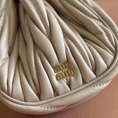 MIUMIU 26S MATELASSE POUCH BAG 16 IN LIGHT BEIGE CALFSKIN GOLD HARDWARE