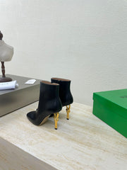 KNOT ANKLE BOOT IN BLACK CALFSKIN WITH GOLD METAL HEEL 9 CM