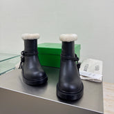 BOTTEGA VENETA 26S FUR-LINED BOOTS IN BLACK CALFSKIN AND WHITE WOOL