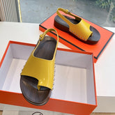 FLAT SANDAL IN CORN YELLOW CALFSKIN