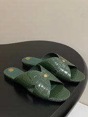 FLAT SLIPPERS IN MOSS GREEN CALFSKIN SNAKE EMBOSSING