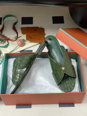 FLAT SLIPPERS IN MOSS GREEN CALFSKIN SNAKE EMBOSSING