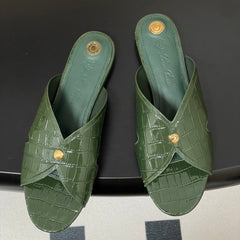 FLAT SLIPPERS IN MOSS GREEN CALFSKIN SNAKE EMBOSSING