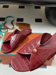 FLAT SLIPPERS IN RED CALFSKIN SNAKE EMBOSSING