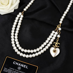 CHANEL 25S CHAIN BELT IN WHITE PEARL 614404