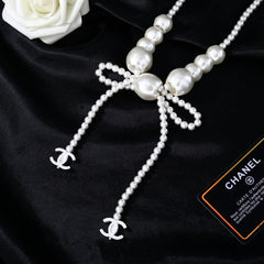 CHANEL 25S CHAIN BELT IN WHITE PEARL WITH BOW 614475