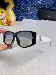 TRIOMPHE SUNGLASS 566216 IN BLACK AND WHITE ACETATE