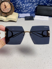 30MONTAIGNE S7U SUNGLASS 578110 IN GOLD METAL GREY LENSES