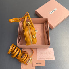 MICRO BAG KEYCHAIN 11 IN INDOCHINE ORANGE CALFSKIN EMBOSSED LOGO