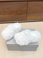 BALENCIAGA 25S MULES IN WHITE FAUX FUR