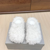 BALENCIAGA 25S MULES IN WHITE FAUX FUR
