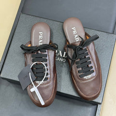 PRADA 25S COLLAPSE MULES IN DARK BROWN CALFSKIN