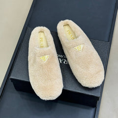 PRADA 25S CLOGS IN BEIGE SHEARLING