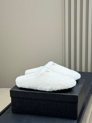 PRADA 25S CLOGS IN WHITE SHEARLING