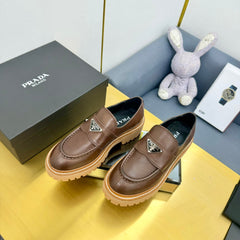 LOAFER WITH TRIANGLE LOGO IN CHOCOLATE BROWN CALFSKIN