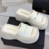 PLATFORM SLIPPERS IN WHITE LAMBSKIN