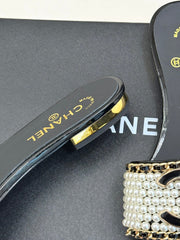 CC SLIDE SANDALS IN BLACK AND WHITE PEARL