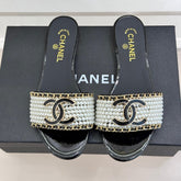 CC SLIDE SANDALS IN BLACK AND WHITE PEARL