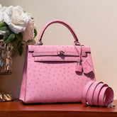 KELLY SELLIER 25 BAG IN DOLL PINK OSTRICH LEATHER WITH SILVER HARDWARE