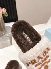 PRADA 25S FLAT MULES IN WHITE AND DARK BROWN RABBIT FUR