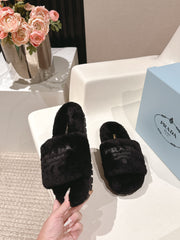 PRADA 25S FLAT MULES IN BLACK RABBIT FUR