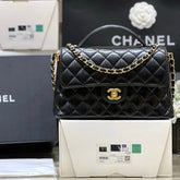 QUILTED FLAP BAG WITH HANDLE 26 IN BLACK LAMBSKIN GOLD PLATED METAL