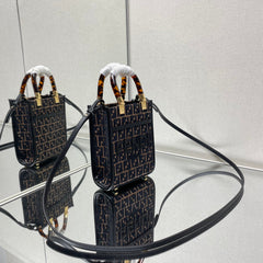 MINI SUNSHINE 18 IN BROWN RAFFIA AND BLACK WOOL CALFSKIN TRIM