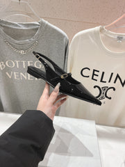 JUDY FLAT SLINGBACK IN BLACK PATENT CALFSKIN