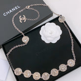 TWISTED CHAIN BELT WITH RHINESTONES AND LOGO PLATE IN SILVER TONE