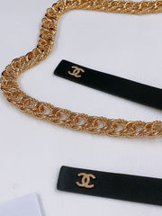 RIBBED BOW WAIST CHAIN IN GOLD TONE BRASS AND BLACK LAMBSKIN