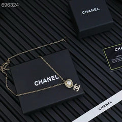 PENDANT NECKLACE IN GOLD TWISTED RIBBED DOUBLE C