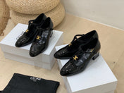 TRIOMPHE T-BAR HIGH PUMPS IN BLACK PATENT CALFSKIN